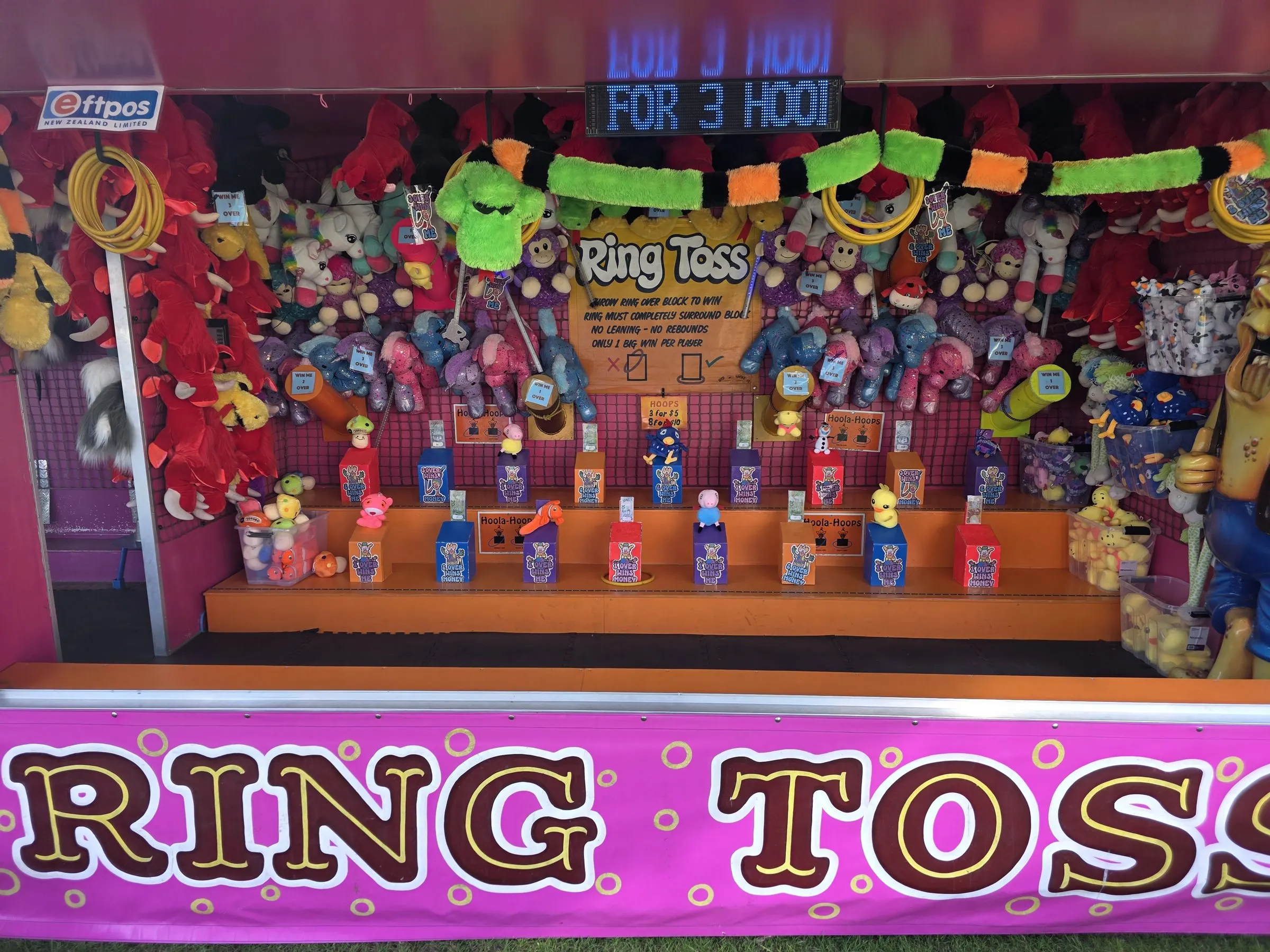 Ring Toss stall packed with soft toy prizes